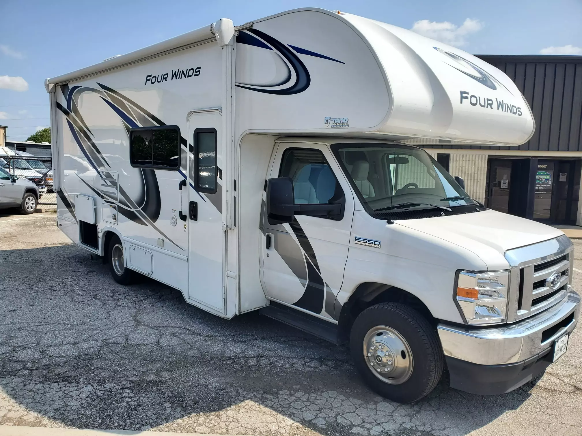 White Four Winds RV parked outside