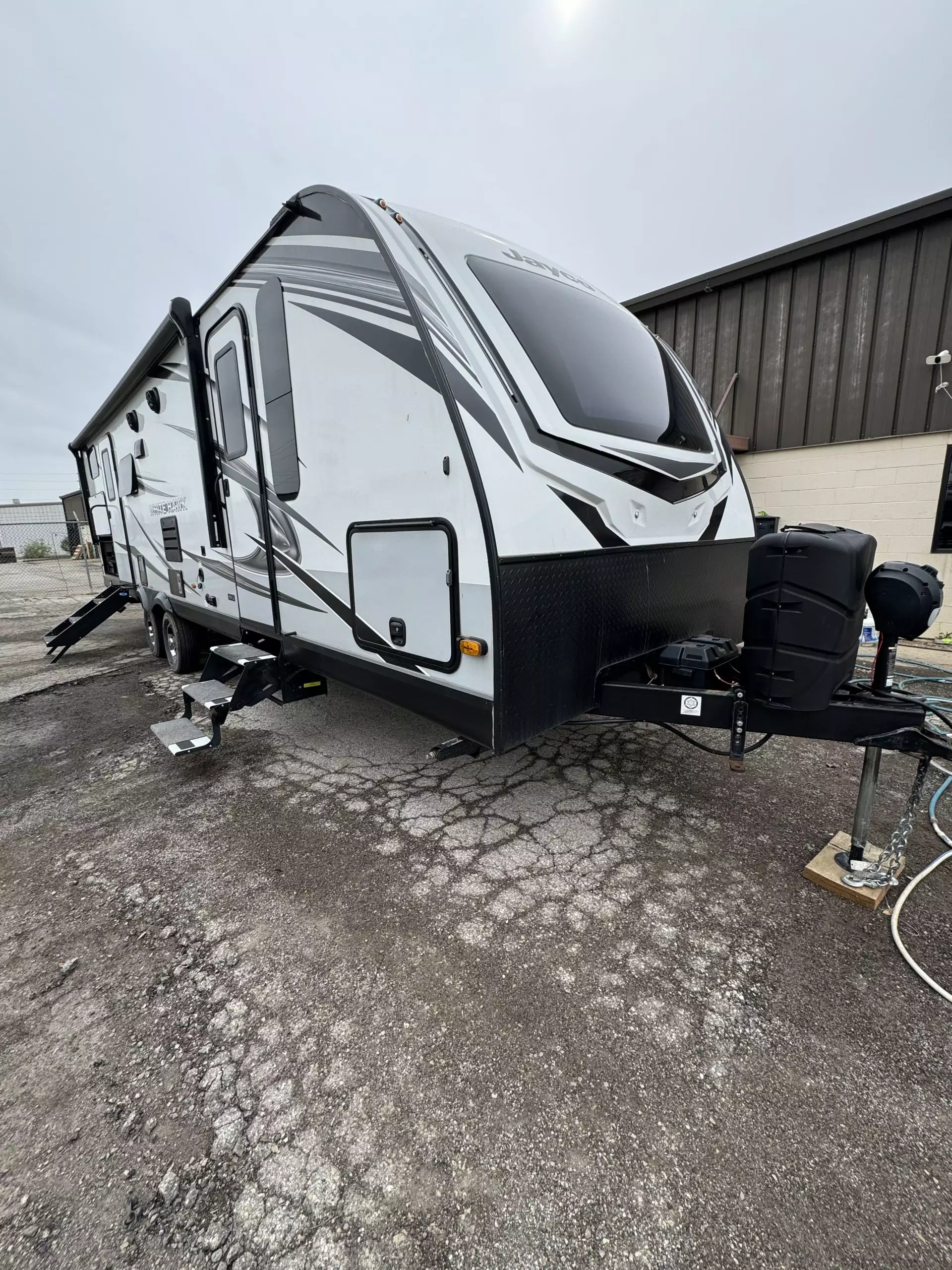 White camper with black accents