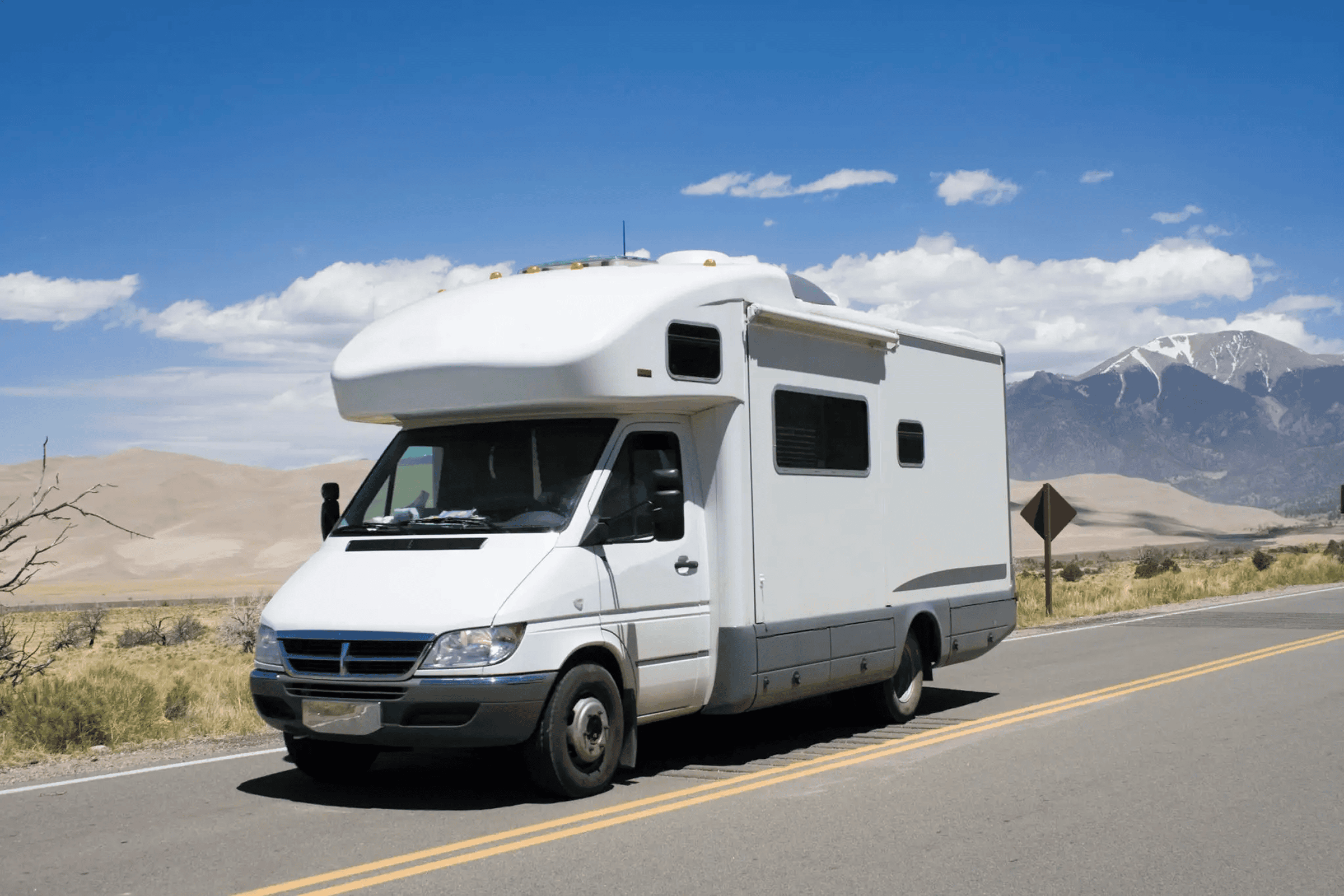 RV journey with mountains in background