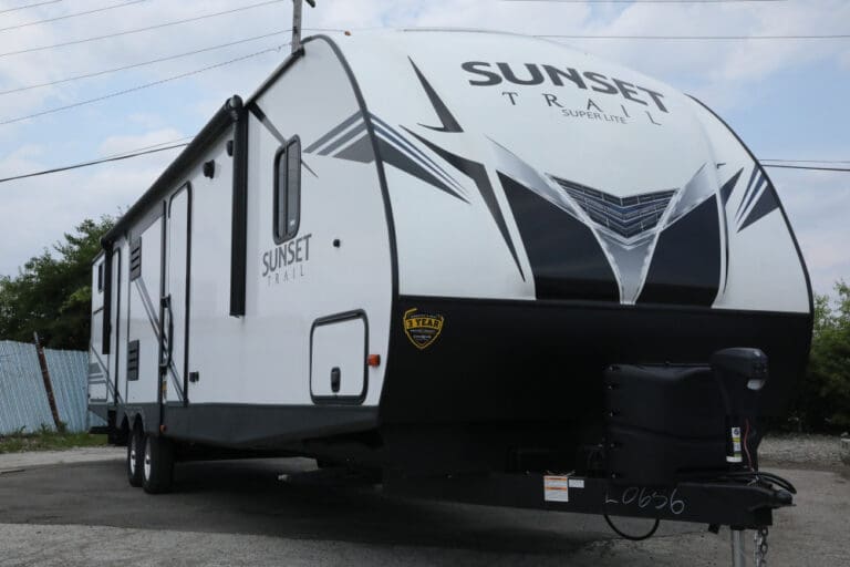 Large camper trailer with distinctive graphics.